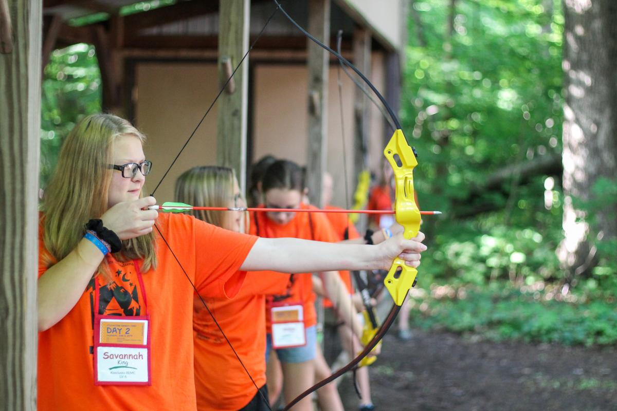 Kids practicing archery